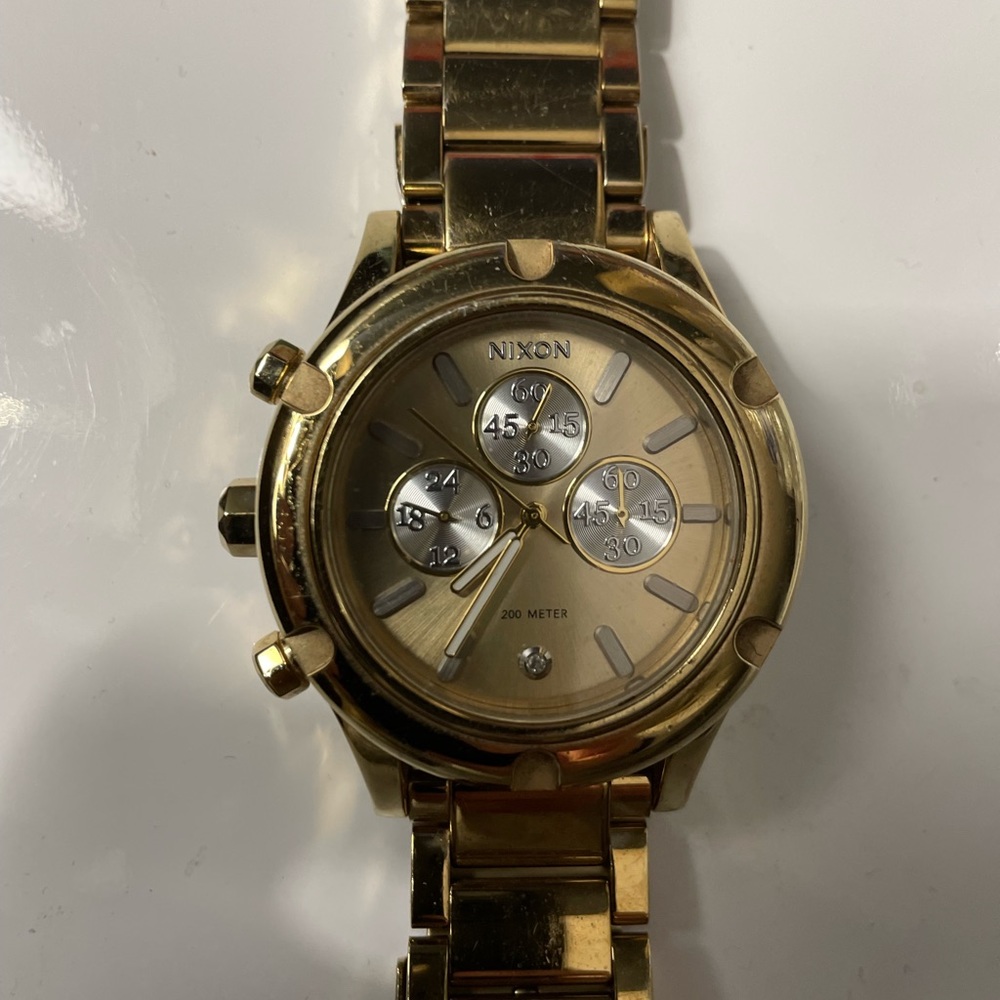 Gold Plated Nixon Watch with Diamond